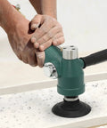 Heavy Duty Pneumatic Angle Grinder With Variable Speed And Tank Build For Stainless Steel Polishing And Granite Shaping No Fuss Hookup One Quarter Inch Air Inlet Daily Driver Shop Workhorse Tool in use smoothing granite.