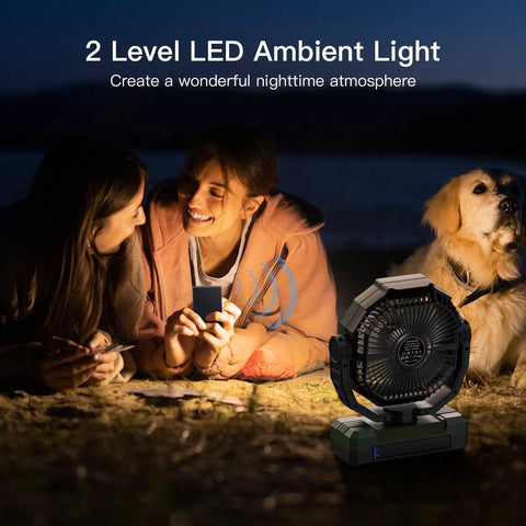 Two people and dog sitting outside with 3 In 1 Camping Fan Portable Rechargeable 24000mAh Battery Powerhouse With Light