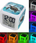 Super Chill Digital Cube Alarm Clock With Quiet Sweep Motion Dreamy Ocean Turtle Graphic Retro Stamp Accents Blue Desktop Display in multiple colors.