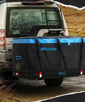 Big 25 Cu Ft Weatherproof Trailer Hitch Cargo Carrier Bag Set mounted on SUV, durable black vinyl, blue accents, secure straps