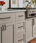 Brushed Gold Cabinet Pulls 4 Inch Hole Centers 102mm Arch Design 10 Pack installed on kitchen cabinets