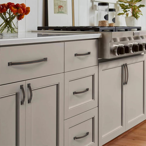 Brushed Gold Cabinet Pulls 4 Inch Hole Centers 102mm Arch Design 10 Pack installed on kitchen cabinets
