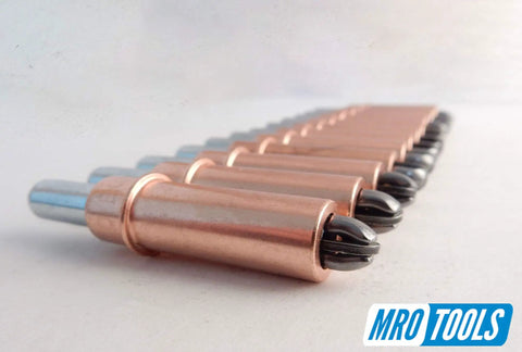 Pro Grade 1/4 Inch Cleco Fastener Kit for Auto Body Repair with 10 copper Cleco fasteners aligned on a surface