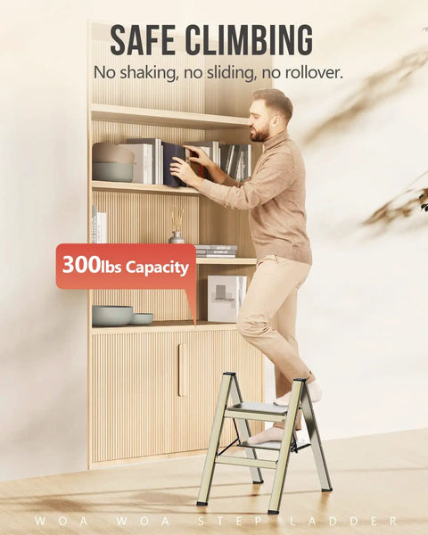 Man using Two Step Aluminum Folding Ladder For Home Use Lightweight Portable Step Stool With Anti Slip Pedals Easy Fold 300 Pound Capacity Great For Kitchen Closet And Garage Gold Finish to reach high shelf.