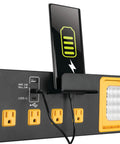 Heavy Duty Commercial Grade Power Station With Six Outlets And Two USB Ports Built In Cradle And Pivoting 1000 Lumen LED Lights Ideal For Garages, Workshops, And Job Sites shown with phone charging.