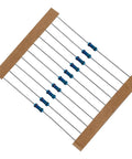 Blue metal-film axial resistors with color bands on a brown carrier strip, angled front view
