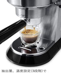 Top Drawer Stainless Steel Espresso Machine And Coffee Maker With Built In Milk Frother For Killer Cappuccinos pouring coffee.