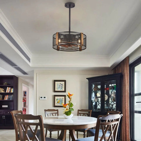 17 Inch Farmhouse Ceiling Fan With Lights Cage Style Bladeless Look hanging in a dining room with a modern rustic decor