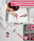 Pink Mini Tool Kit For Women, 48-Piece Multi-Purpose Home Hand Tool Set With Case, Essential Household Repair Kit displayed next to drawer being fixed