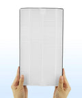 Hands holding an Advanced Allergen Reduction True HEPA H13 Replacement Filter for 3M Filtrete room purifier, vertical view.