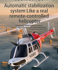 C138 RC Helicopter 2.4G 6CH 6-Axis Gyro Altitude Hold Ready To Fly RTF With 3D Roll flying over cityscape at sunset