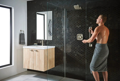 Bathroom with glass shower door and modern sink, featuring Check Out This Rock Solid Twelve Inch Bathroom Grab Bar In Brushed Nickel Finish