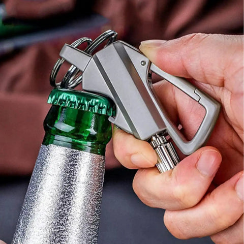 Person using 3 In 1 Lighter With Permanent Match Function, Multitool Keychain Bottle Opener, Car Keychain Lighter on bottle.