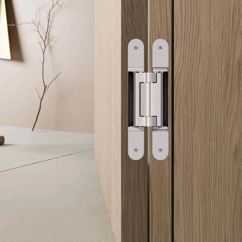 Concealed Door Hinge For Heavy Doors 3D Adjustable TECTUS TE 640 3D A8 240 Mm installed on wooden door, satin nickel look