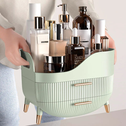 Slick Green Makeup Organizer With Two Deep Drawers And Sturdy Carry Handle, Large Skincare Storage Box For Vanity Tops, filled with skincare bottles.