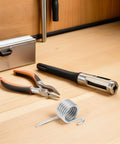 Get These 6pcs Mop Bucket Mechanical Compression Spring Stainless Steel laying on workbench next to tools and toolbox.