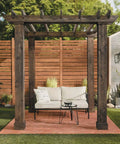 Wooden pergola with bench on a stained patio, showcasing Exterior Stain Semi Transparent Oil Based Neutral Base One Gallon.