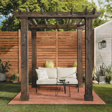 Wooden pergola with bench on a stained patio, showcasing Exterior Stain Semi Transparent Oil Based Neutral Base One Gallon.