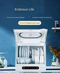 Compact Mini Portable Countertop Dishwasher with dishes inside, ideal for tiny kitchens and college dorms.