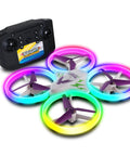 LightHawk 2.4GHz RC Quadcopter Drone With Altitude Hold Daring Stunts Obstacle Avoidance LED Light Show next to remote control