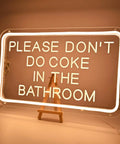 Please Don't Do Coke In The Bathroom LED Neon Sign USB Powered For Bedroom Game Room Bar Or Home Decor 15.8 By 9.8 Inches With 6.6 Ft USB Cord And Dimmer on easel, warm glow