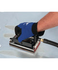 Top Shelf Pneumatic Orbital Sander With Built In Air Regulator And Rubber Over Mold Grip in use on a workshop surface.