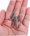 Top Quality 100 Pieces Mini Stainless Steel Compression Springs Assortment Kit For Cool DIY Repairs And Varying Mechanical Projects Perfect To Fix Stuff At Home Or In The Garage With Ease. Mini stainless steel springs in hand