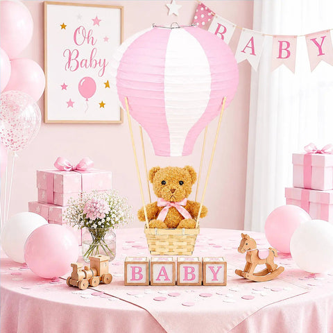 Bear Themed Hot Air Balloon Centerpiece Kit For Baby Shower And Gender Reveal With 6 Pink Paper Lanterns displayed on baby shower table.