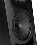 Close-up of LP-6 V2 6.5 Inch Powered Studio Monitor with sleek black design and speaker detail for music production.