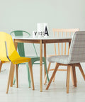 Top Shelf Furniture Hardware Pack Including Thirty Heavy Duty Plastic Drawer Stops For Dresser Repairs Square And L Shaped Cabinet Gliders Zero Hassle Setup, colorful chairs around a wooden table.