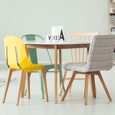 Top Shelf Furniture Hardware Pack Including Thirty Heavy Duty Plastic Drawer Stops For Dresser Repairs Square And L Shaped Cabinet Gliders Zero Hassle Setup, colorful chairs around a wooden table.