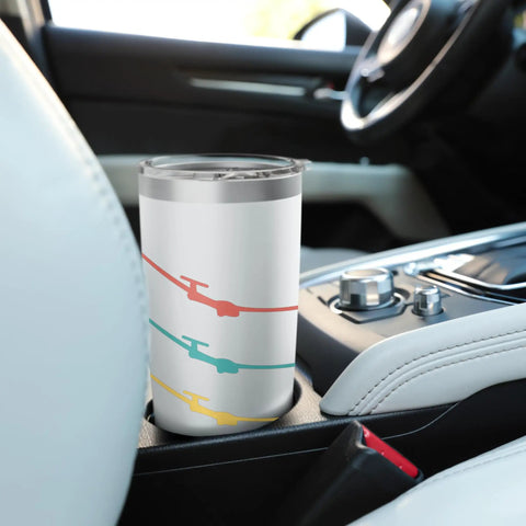 Insulated Stainless Steel Tumbler For Glider Pilots And Aviation Nerds in car cup holder, white with colorful glider design.