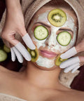 Facial massage with Latex Finger Cots Disposable Medium Size Rolled Edge Protectors For Fingertips Thumb Covers on a spa client.