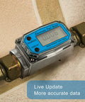 Digital turbine flow meter with display installed on pipe, ideal for measuring fuel and water, focus on live update and accurate data