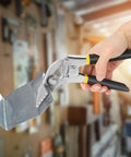 Hand holding sheet metal bender pliers with 3 inch offset jaw and seven and a half cm long jaw for tight spaces in HVAC projects.