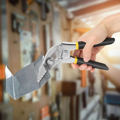 Hand holding sheet metal bender pliers with 3 inch offset jaw and seven and a half cm long jaw for tight spaces in HVAC projects.
