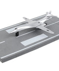 Runway24 B1 Die Cast Vehicle With Connected Runway Pieces Silver on display runway section
