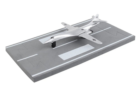 Runway24 B1 Die Cast Vehicle With Connected Runway Pieces Silver on display runway section