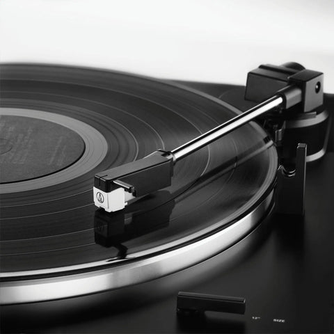 Audio-Technica Black Belt Drive Turntable Features Wireless Bluetooth High Fidelity Stereo Sound Automatic Operation anti resonance die cast aluminum platter with vinyl record playing.