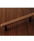 Walnut wood drawer pull with metal base, 5.04-inch hole centers, shown on wooden surface, ideal black dresser hardware with screws.
