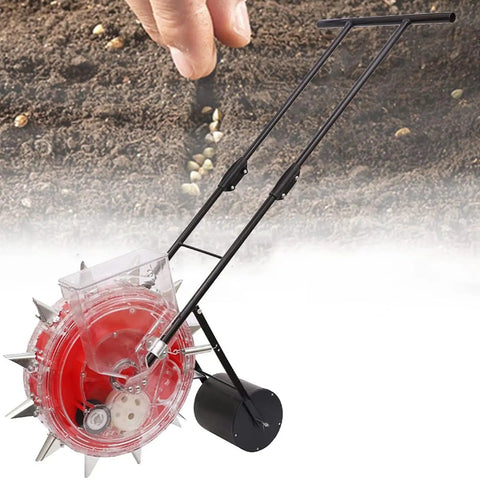 Metal Garden Seeder With 12 Seed Outlets Walk Behind Precision Planter in a garden next to hand planting seeds in soil.