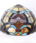 Detailed view of the shade for Orange Stained Glass Flower Tiffany Style Table Lamp For Reading Desk And Bedside Use 12 Inch Wide Shade 18 Inch Tall With Antique Green Bronze Base UL Listed Cord Switch Ideal For Bedroom Living Room Or Home Office Decor, showcasing the intricate stained glass design with orange and blue pattern.