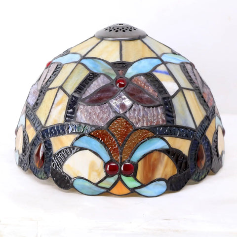 Detailed view of the shade for Orange Stained Glass Flower Tiffany Style Table Lamp For Reading Desk And Bedside Use 12 Inch Wide Shade 18 Inch Tall With Antique Green Bronze Base UL Listed Cord Switch Ideal For Bedroom Living Room Or Home Office Decor, showcasing the intricate stained glass design with orange and blue pattern.