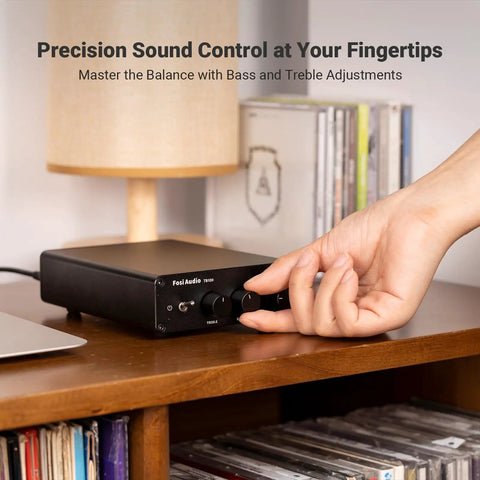 Hand adjusting controls on Beefy 2 Channel Class D Desktop Amplifier powered by TPA3255 with 600W total power, near records.