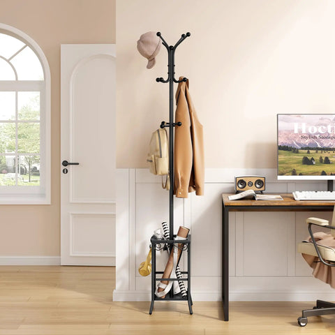 Freestanding Coat Rack With Umbrella Holder, Metal Coat Tree With 12 Hooks in black finish by an office desk and entryway