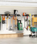 64 Inch Garage Storage Wall Mount Tool Organizer With 620Lb Load Capacity Heavy Duty Metal Hooks holding tools in garage.