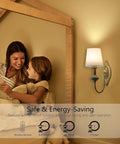 Vintage Wireless Wall Sconce Set Of Two Rechargeable Gold Led Accent Lamps With Fifteen RGB Mood Tones Zero Cord Hassle Super Easy Mount For Living Room Vibe, illuminating a cozy bedroom scene with mother and child.