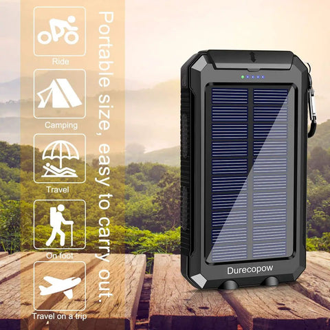 Rugged 8000mAh Solar Charger Power Bank For Outdoor Adventures, waterproof, with USB C ports, carabiner, compass, and LED flashlight on wooden surface.