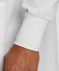 Close-up of a sleeve cuff on a Relaxed Fit Unisex Full-Length Lab Coat With Snap Front And Two Spacious Pockets, Durable Workwear Coat.