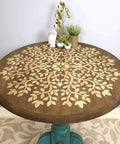 Tree Of Life Mandala Wall Stencil 36 Inch Large Reusable Laser Cut Mylar Template on round wooden table for decor
